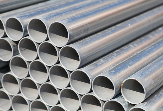 Close - up Stack of construction metal pipes