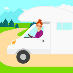 Woman driving motor home.