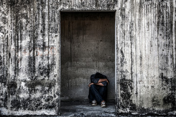 some people sitting in scary abandoned building