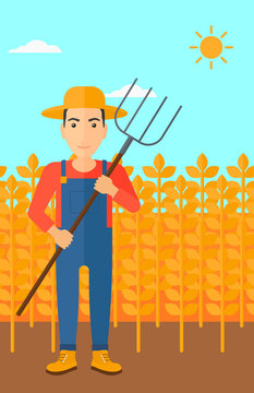 Farmer with pitchfork.