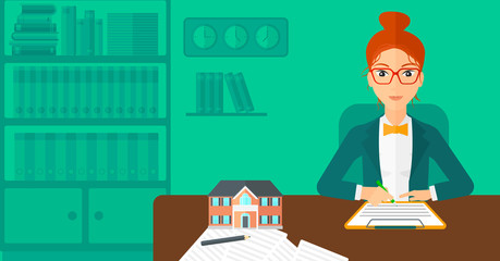 Real estate agent signing contract.