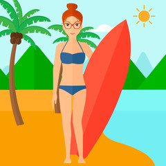 Surfer holding surfboard.