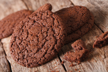 Fresh chocolate cookies with cracks close-up on the table. Horizontal
