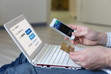 Person shopping making Mobile Payment with Telephone