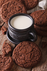 Homemade chocolate cookies and milk close-up. vertical
