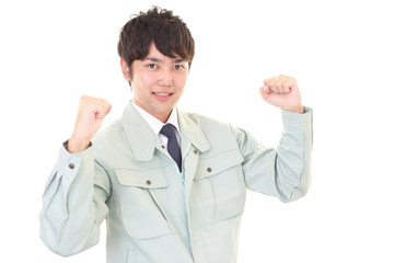ガッツポーズの作業員