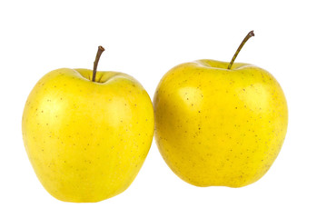 Two yellow apples on a white background