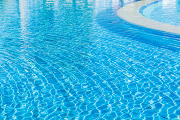 Fototapeta na wymiar soft focus water surface, sun light reflect, water wave outdoor swimming pool