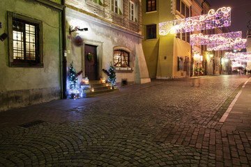 Obrazy na Plexi  Ulica na Starym Mieście w Warszawie nocą