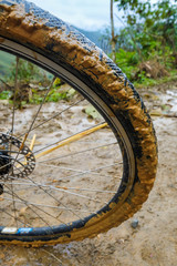 Bicycle wheel in mud