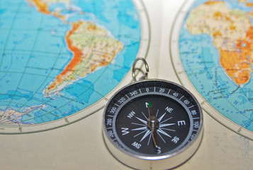 Fototapeta na wymiar compass and the world.