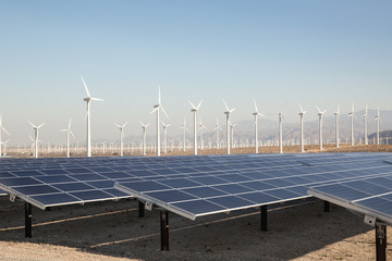 Renewable Solar Energy and Windmills. Solar panels energy in a California desert. Sunlight, solar...