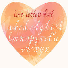 Handmade Love letters font. Hand drawn coursive latin letters in lower case placed in heart shaped watercolor stains imitation.