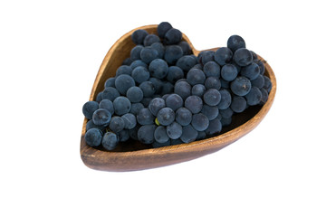 Grapes in a heart shape wooden plate