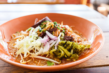 Noodle with spicy pork sup, traditional northern Thai food