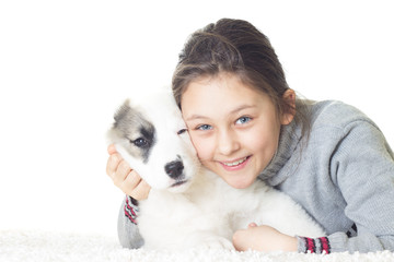 smiling girl and puppy