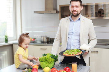 happy father and his child have fun during lunch