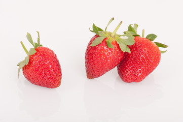 Strawberries, close-up on white background