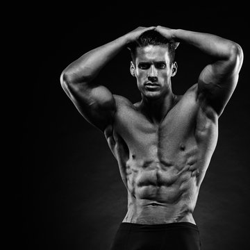 Portrait of a handsome muscular bodybuilder posing