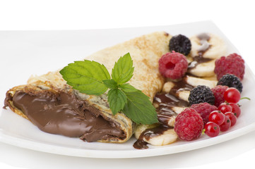 Crepes with chocolate cream and banana