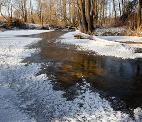 Frozen river in winter wonderland