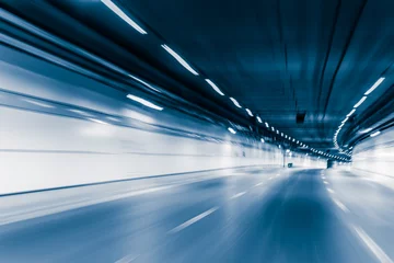 Fotobehang Snelle auto Blauwe kleur tunnel auto rijden bewegingsonscherpte