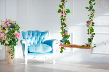 Vintage style chair in classical interior room with sunlight and  flowers