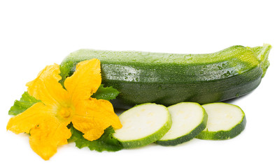 sliced green marrow with flower and leaf