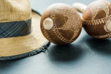 Tuinposter  panama hat and musical instrumet. © marcin jucha
