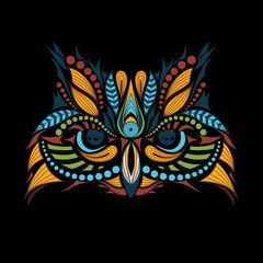 Patterned colored head of the owl on black. African / indian / totem / tattoo design. It may be used for design of a t-shirt, bag, postcard and poster.