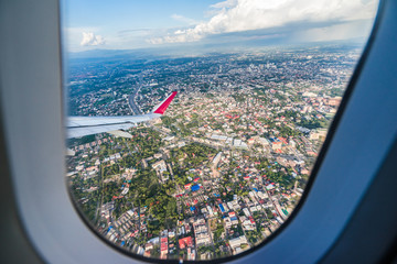 The airplane is taking off over Chiang mai city