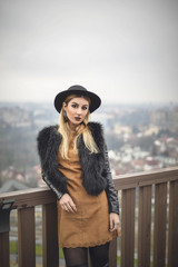 Stylish woman with panoramic view in the background