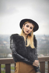 Stylish woman with panoramic view in the background