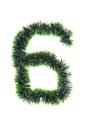 numeral from green Christmas tree decorations on a white background