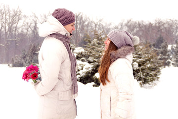 Romantic surprise. Men / boy gifts flower for women / girl in wi