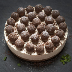 Coconut cheesecake with coconut and white chocolate egg liqueur truffles