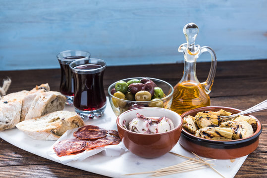 Traditional tapas served on marble board