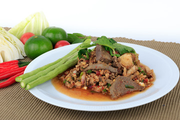 Thai ground pork salad, Spicy minced pork and pork liver salad (Larb Mu) on brown cloth background