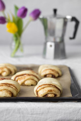 Brioche dough on a tray. Baked concept