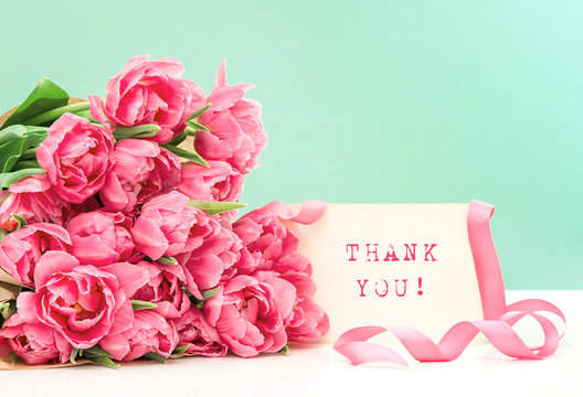Fototapeta Pink tulips and card Thank You! Postcard concept