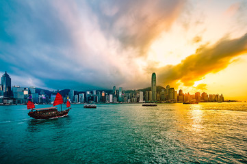 Naklejka premium Victoria harbour of Hong Kong at sunset - HDR