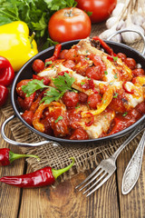 Chicken in a sauce of tomato and pepper