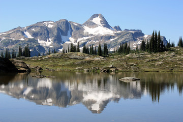 Landscape in Monashee Provincial Park with lake reflection of Mount Fosthall the highest peak in...