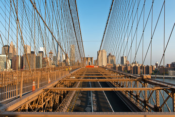 Historic Brooklyn Bridge and Manhattan at Sunset