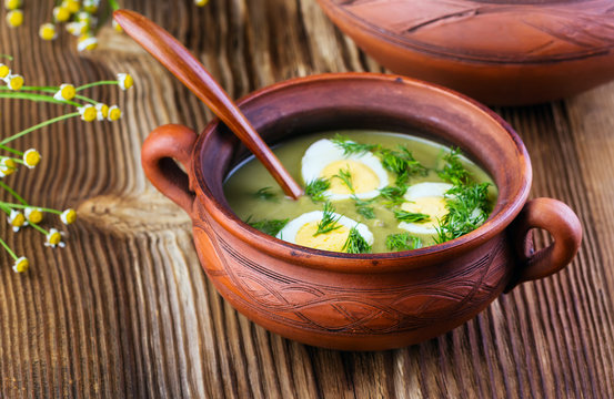 green soup-cream with egg