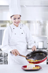 Chef Woman Works in Restaurant Kitchen