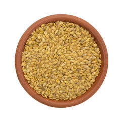 Bowl of organic golden flaxseed on a white background top view