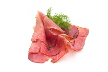 Slices of ham on white background.