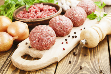 Raw meatballs on the table