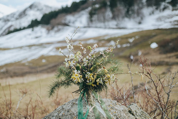 wedding bouquet of pine branches and greenery in a rustic style